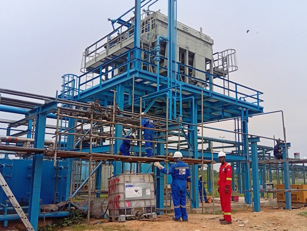 CHAAD Energy team working on industrial equipment at a processing facility